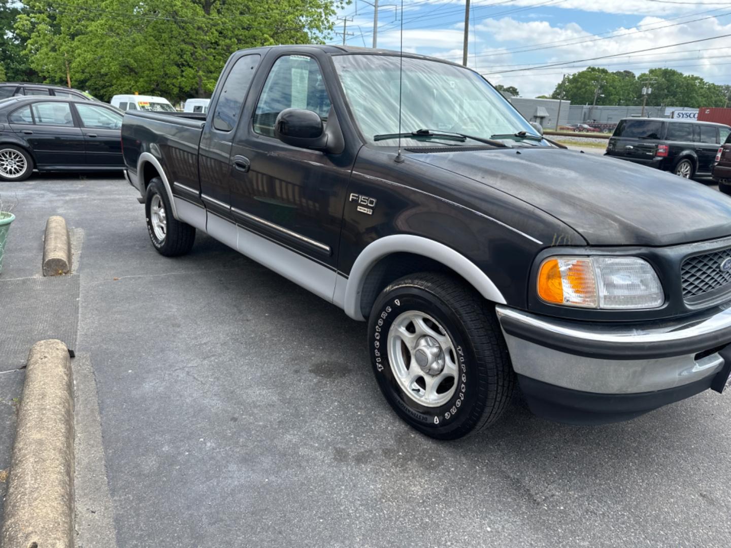 1998 Black Ford F-150 (1FTZX176XWN) , located at 5700 Curlew Drive, Norfolk, VA, 23502, (757) 455-6330, 36.841885, -76.209412 - Photo#4